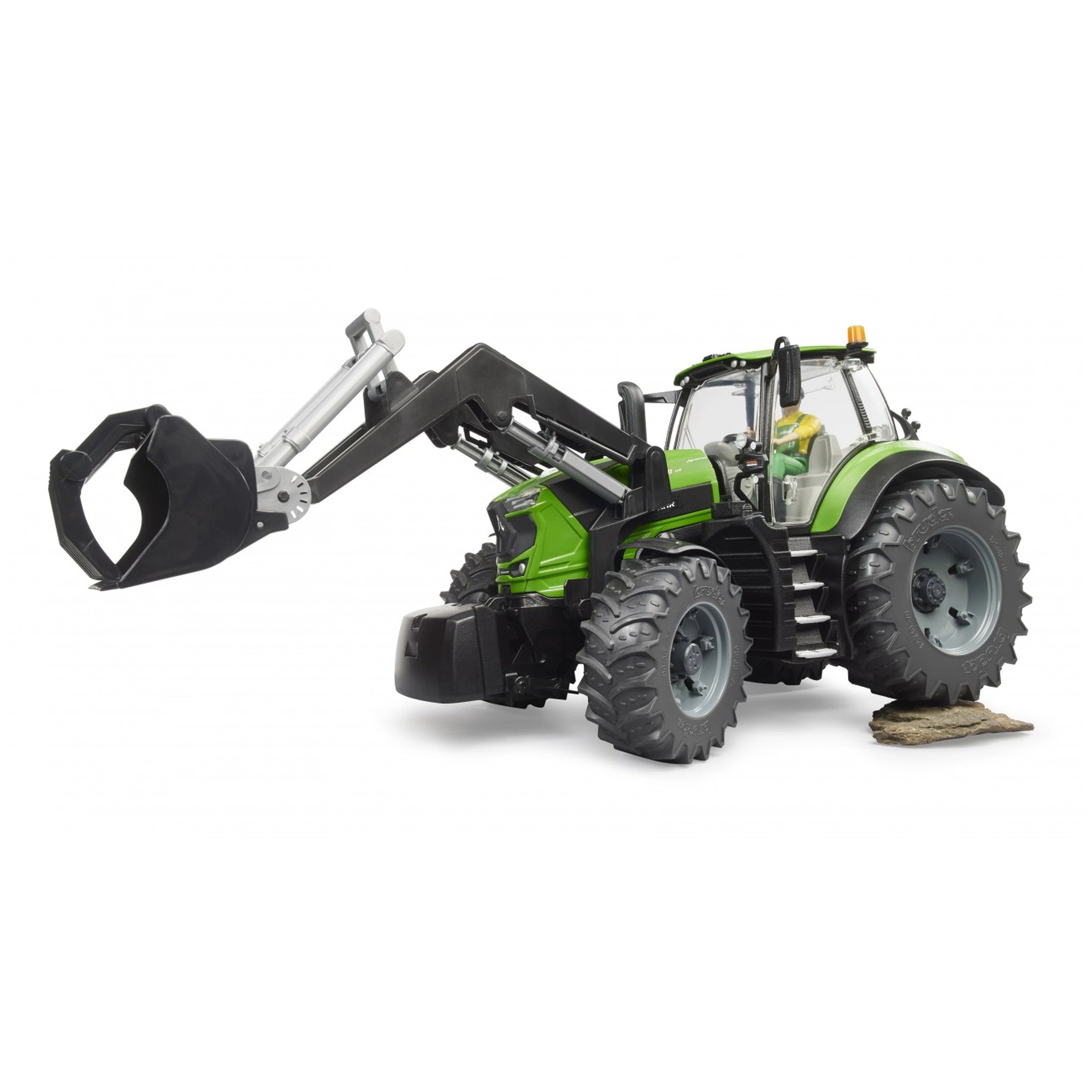 Green Bruder Deutz 8280 TTV toy tractor with frontloader, detailed cab, and large tires on a white background.