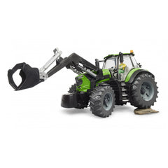 Green Bruder Deutz 8280 TTV toy tractor with frontloader, detailed cab, and large tires on a white background.