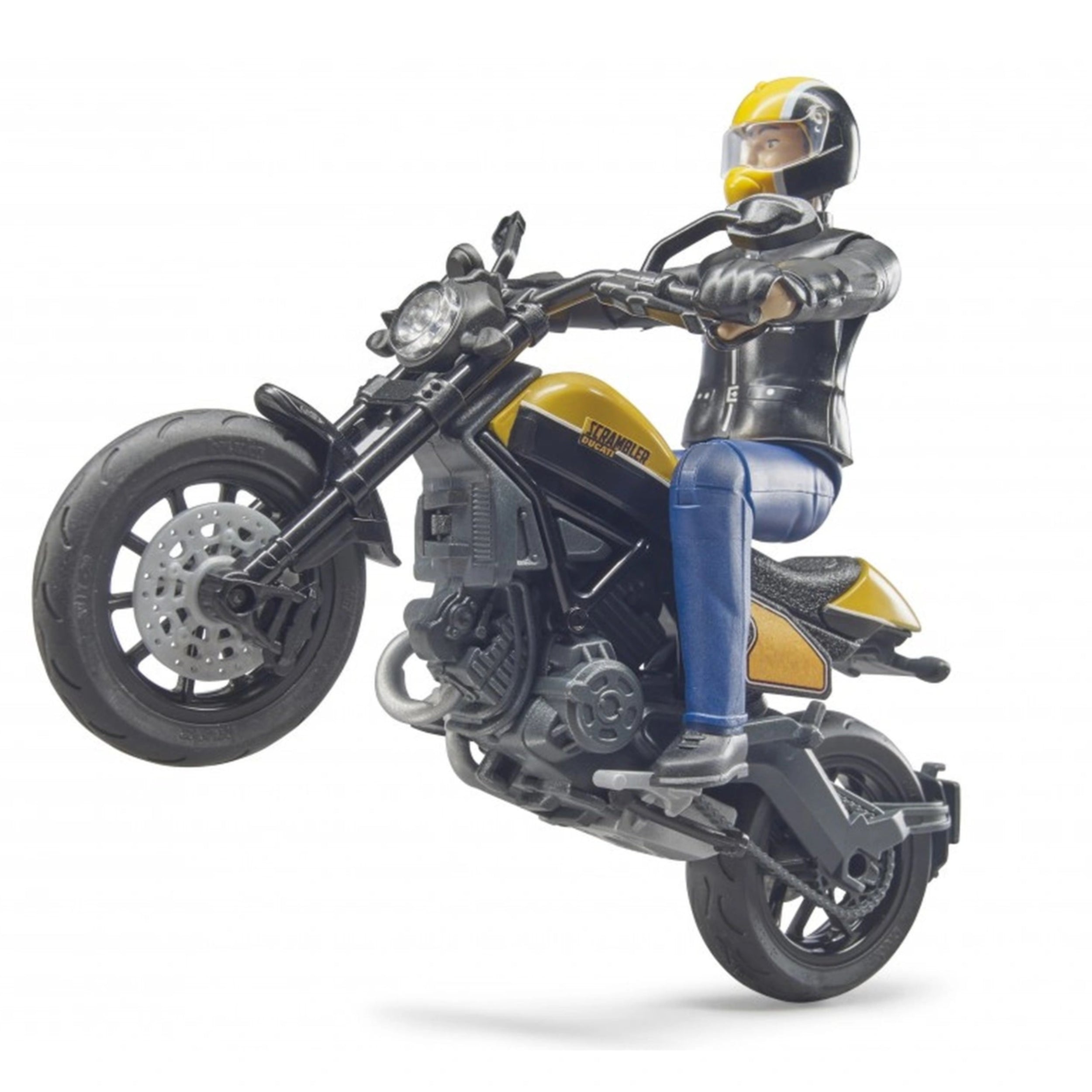 Rider in black gear performs a wheelie on a yellow and black 1:16 scale Bruder Scrambler Ducati toy motorcycle.