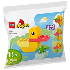 Brightly colored LEGO DUPLO My First Duck set in vibrant yellow and red, featuring a duck model and a green pond base, showcasing the 4-in-1 design.