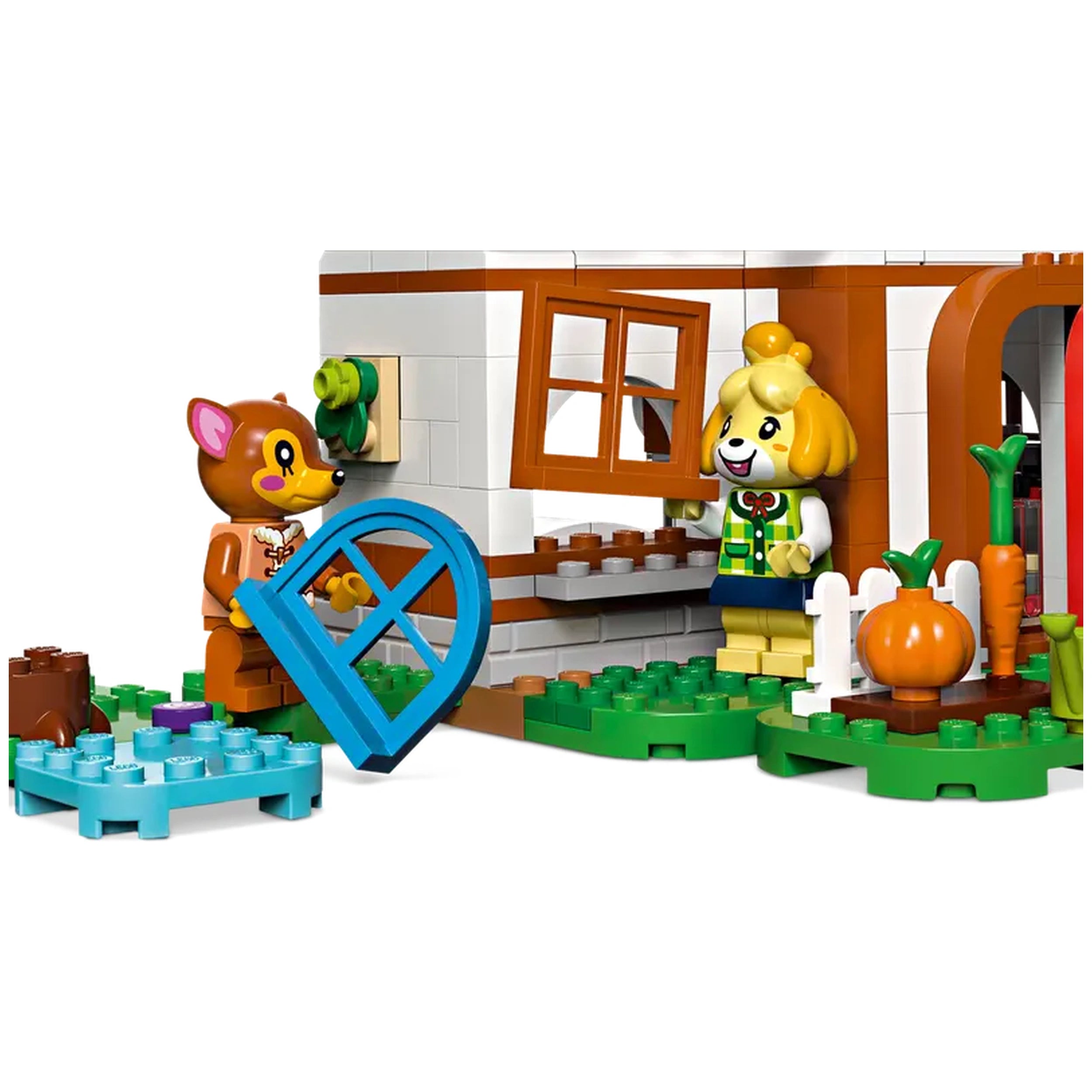 Isabelle and Fauna characters from Animal Crossing stand outside a colorful LEGO house. Isabelle smiles while opening a window, and Fauna holds a blue item, both surrounded by vibrant greenery and garden items like a pumpkin and carrots.