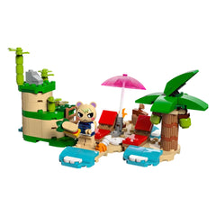 Kapp’n the turtle character holds a sandwich on a sandy beach with green palm trees, colorful deck chairs, and an umbrella, along with building elements from the LEGO Animal Crossing set.