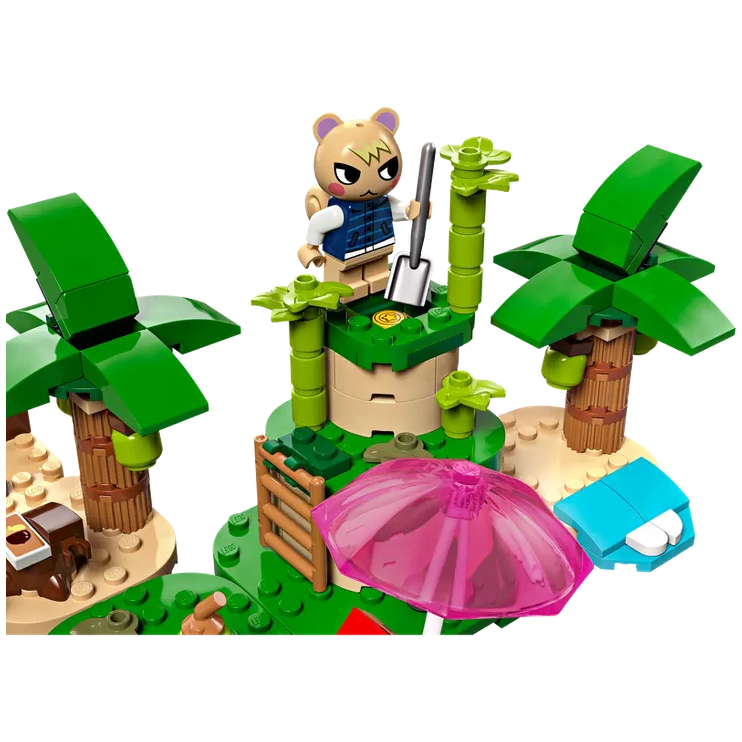 Kapp’n, a bear character from Animal Crossing, stands atop a green island with palm trees. He holds a shovel and is near a pink umbrella, a wooden fence, and colorful blocks depicting the island landscape.