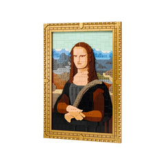 LEGO Art set featuring a vibrant, blocky rendition of the Mona Lisa, framed in an ornate gold frame, with mountains in the background.
