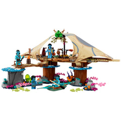 LEGO Avatar Metkayina Reef Home construction set featuring colorful coral reefs, detailed dwelling, and blue-skinned minifigures in vibrant attire.