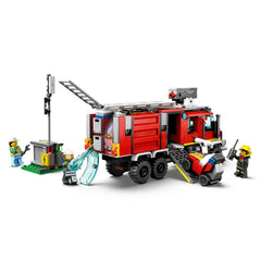LEGO City Fire Command Truck playset with red truck, detachable control center, fire drone, and three minifigures engaging in firefighting actions.