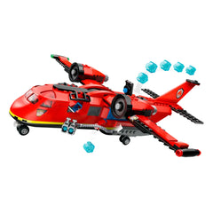 Red LEGO City Fire Rescue Plane set in mid-flight, featuring dual engines, water launchers, and a detailed cockpit, ideal for adventurous play.