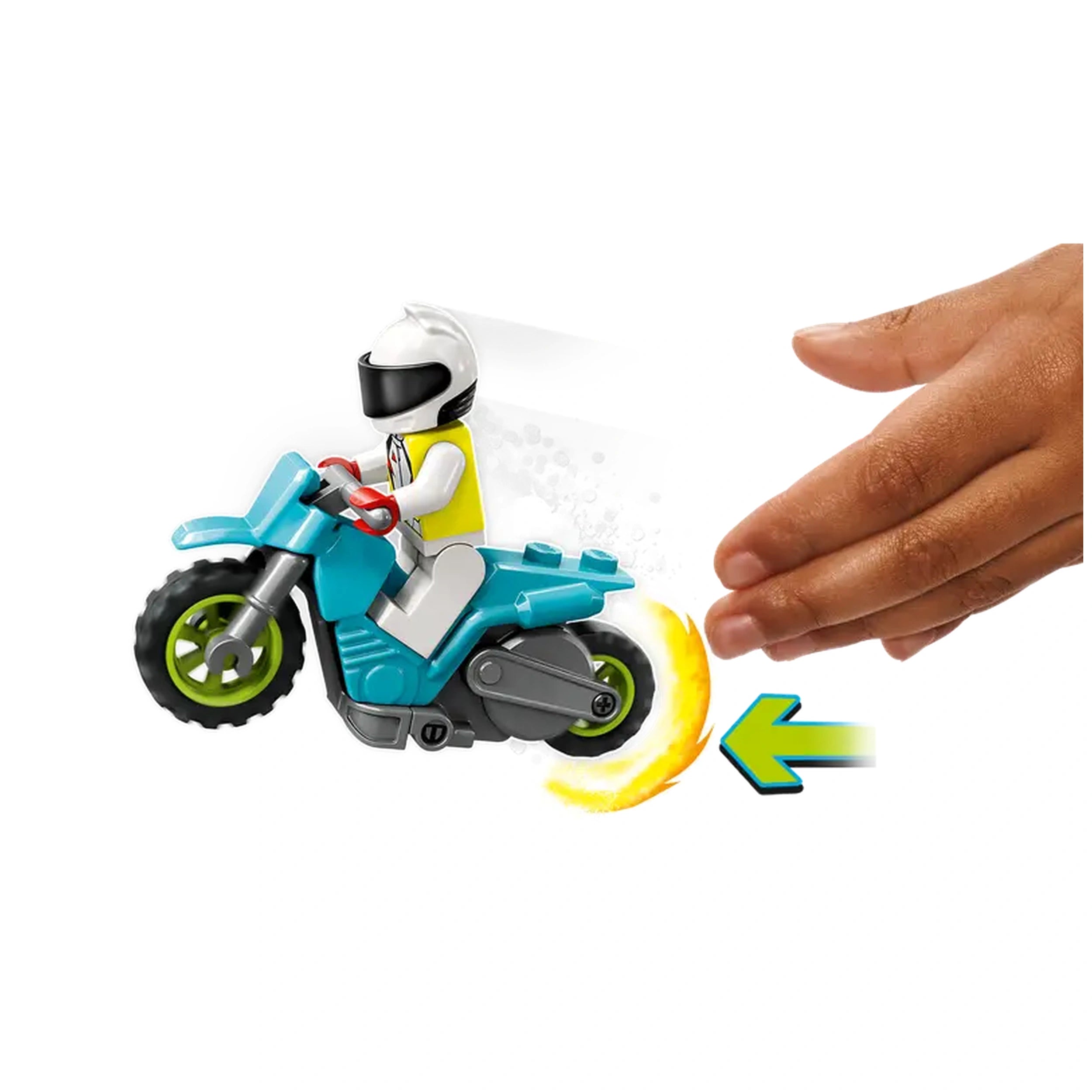 A blue stunt motorcycle with a rider in a white helmet and yellow vest, launching off the ground with fiery exhaust, while a hand gestures towards it.
