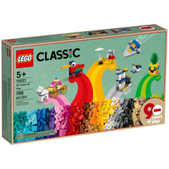 Colorful LEGO® Classic box featuring the 90 Years of Play set, showcasing various mini builds, age recommendation 5+, and 1100 pieces.