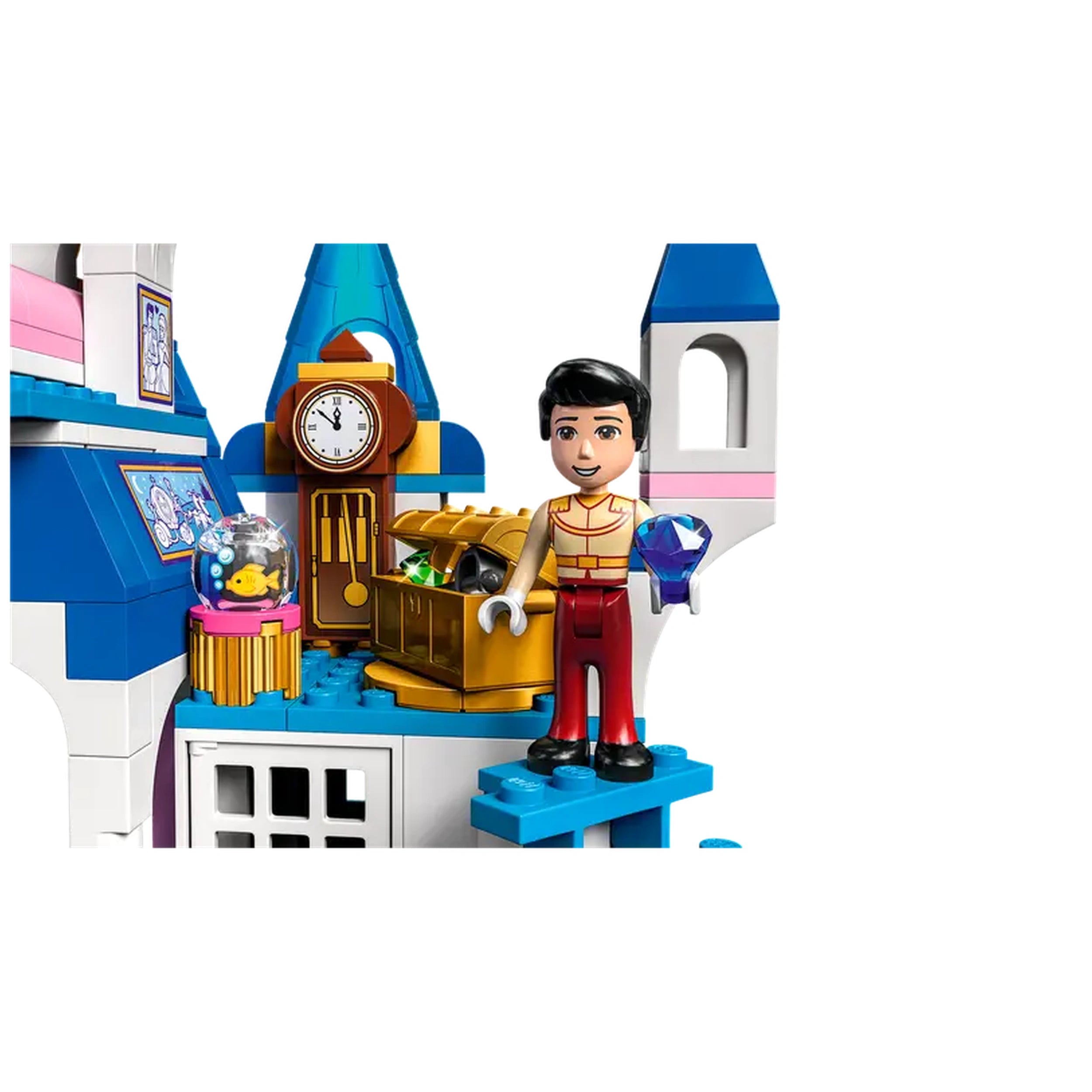 Prince Charming mini-doll figure stands on a blue platform inside a colorful LEGO castle, holding a sparkling gem. Behind him, a clock and a treasure chest filled with jewels add to the enchanting scene.