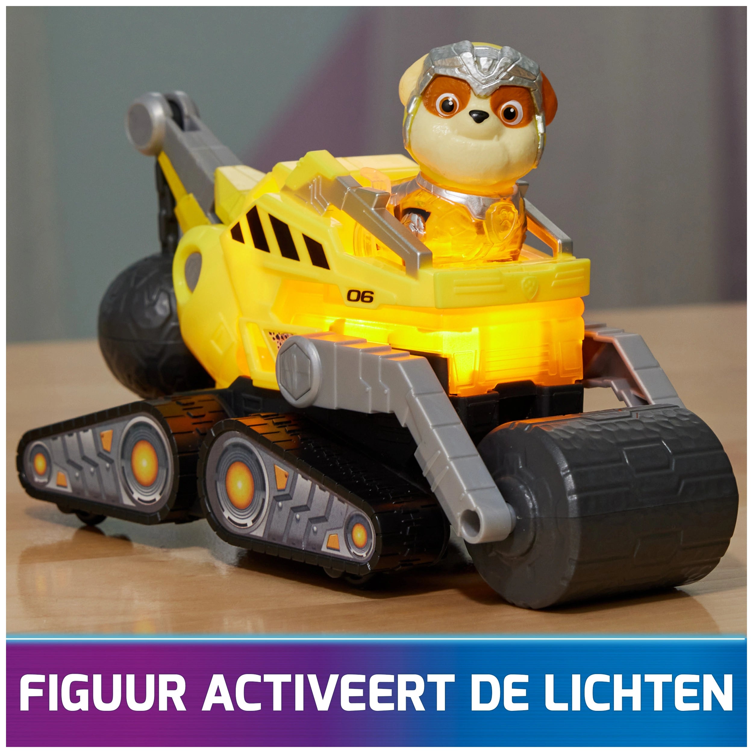 Paw Patrol La Película Poderosa Camión de Construcción con Figura de Acción Rubble Mighty Pups con Luces y Sonidos