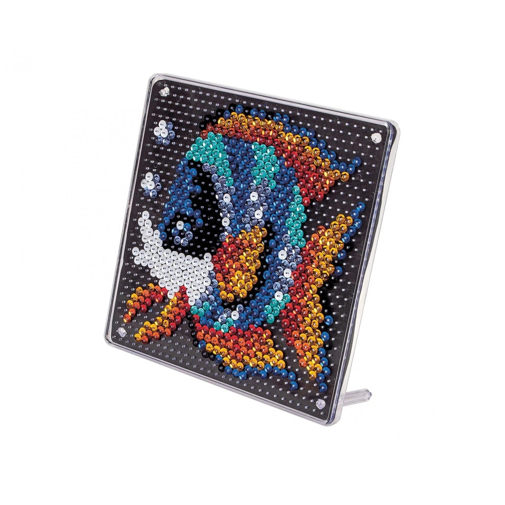 Ammirate sequin fish art activity features a colorful, glossy decorative object with a vibrant, textured underwater design.