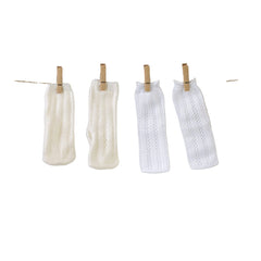 ASI Dolls beige socks for dolls, featuring a textured knit pattern, displayed hanging on a white background.