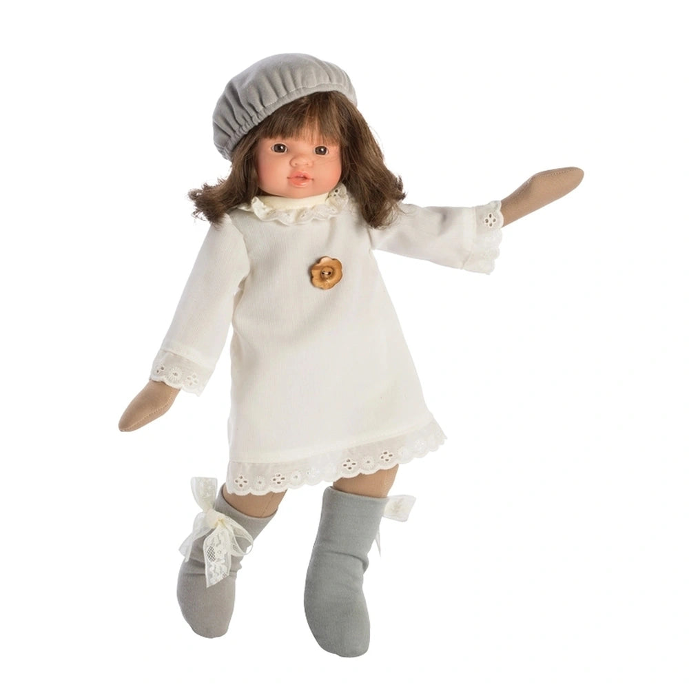 Berta doll in white lace dress and gray hat, featuring brown hair and gray boots with lace bows.