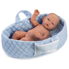 Baby doll resting in a light blue quilted carrycot with white stars, featuring soft handles and a cozy interior.