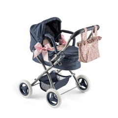 Dark blue toy stroller with pink bows, floral bag, and detachable canopy for dolls, from Asi Dolls Cloe Collection.