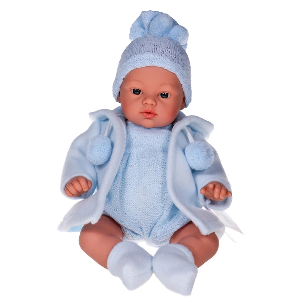 Lifelike 36 cm Spanish Koke doll in a knitted blue dress and hat, with soft vinyl skin and realistic features.
