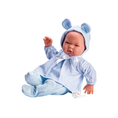 Pablo doll in blue hearts dress, wearing hat with ears, posed on a white background.