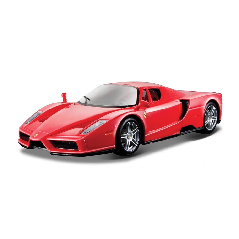 Ferrari Race Play 1:24 die-cast vehicle in red with black wheels, clear glass windows, and detailed metal components.