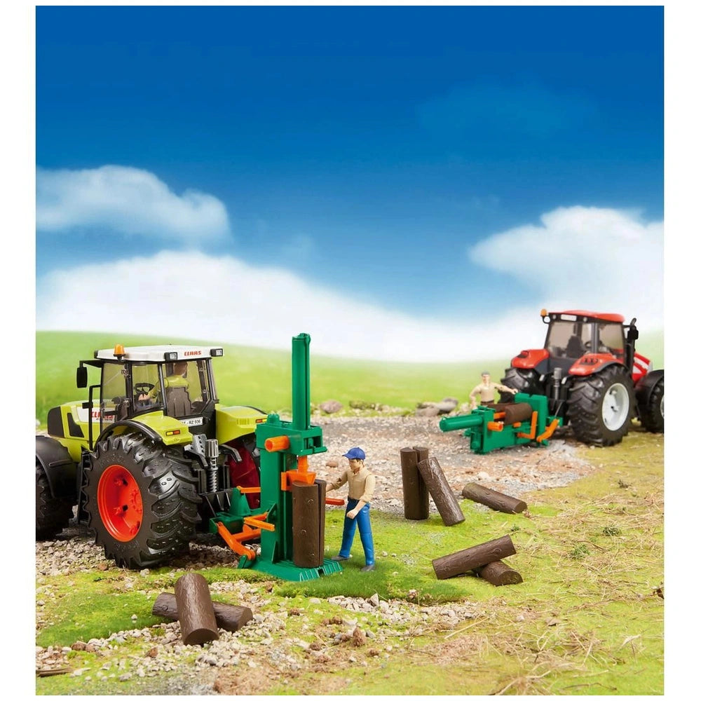 Toy forestry set with two toy tractors, log splitters, and action figures on a grassy landscape under a clear blue sky.