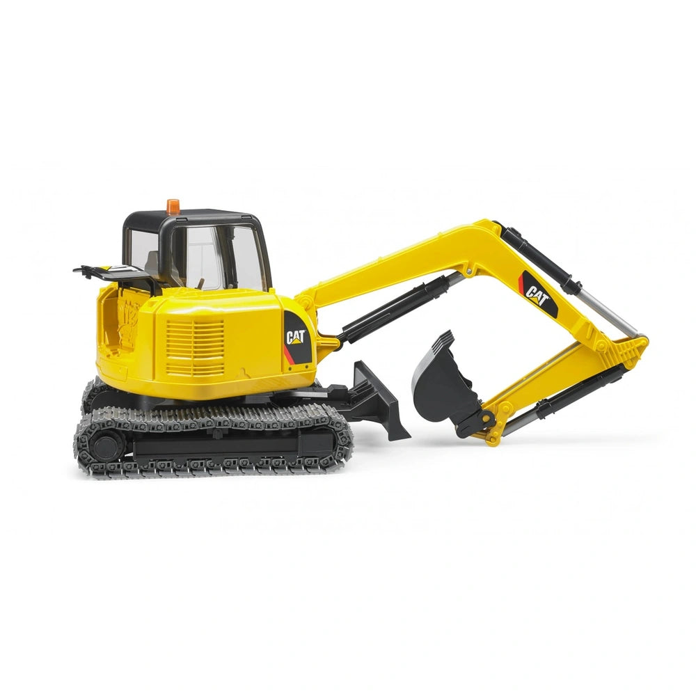 Yellow Bruder Cat Mini Excavator toy with realistic features and tracked chassis on white background.