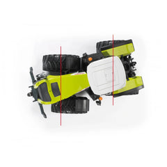 Bruder Claas Xerion 5000 toy tractor, lime green and white, aerial view, visible cab and chunky black tires.