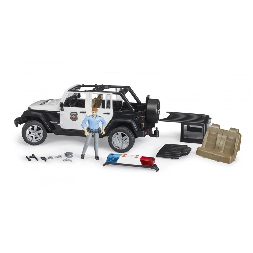 Jeep Wrangler Police vehicle toy with policeman figure, roof, seats, and accessories on display.