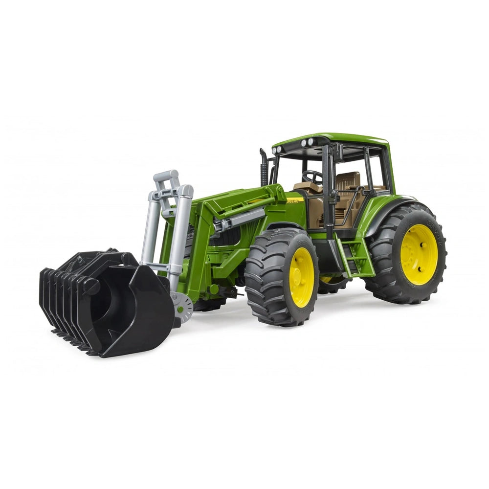 Bruder John Deere 6920 toy tractor with green body, yellow wheels, and black frontloader attachment.