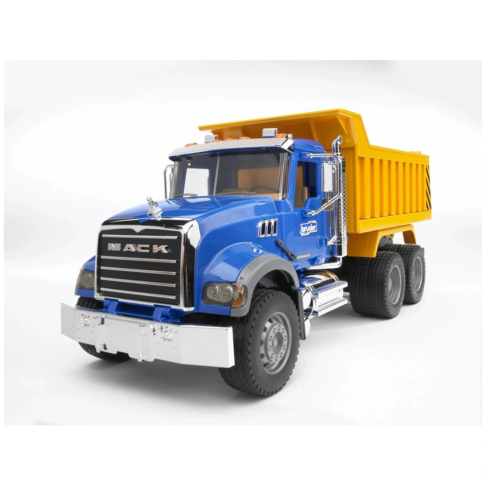 Blue and yellow Bruder MACK Granite Tip Up Truck with chrome accents and detailed cab, ideal for imaginative play.
