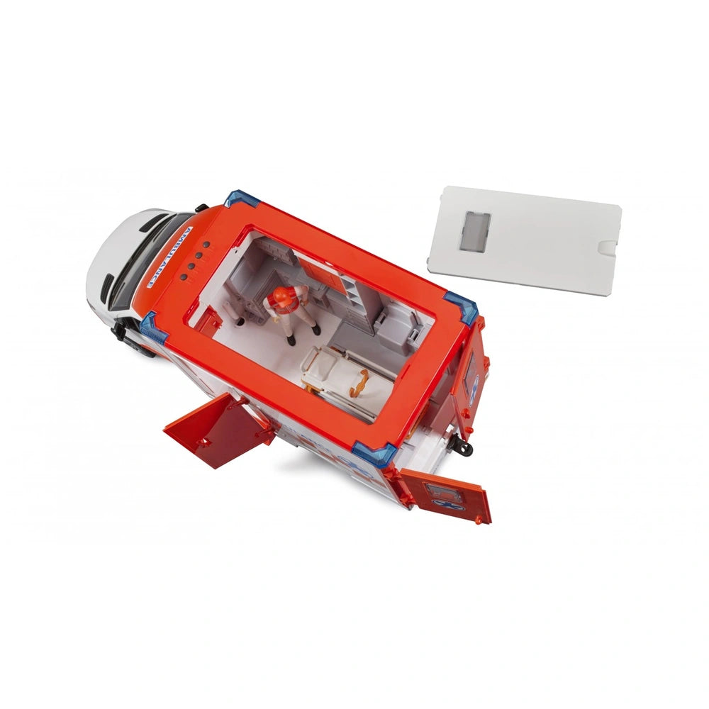 Red and white toy ambulance with open roof view, showing detailed interior and lifeguard figure inside.