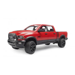 Red Bruder RAM 2500 Power Wagon toy truck with black detailing and large wheels.