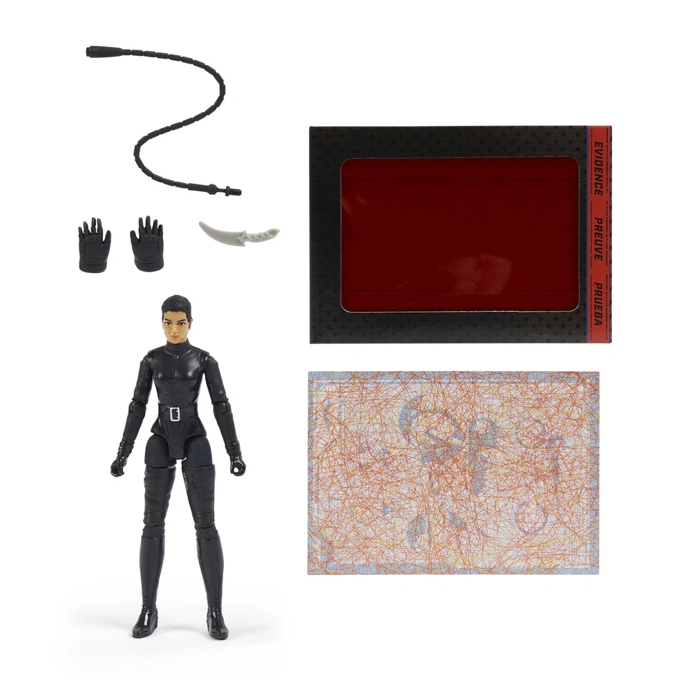 Batman Selina Kyle action figure stands with a black glove, red box, and a white map on a white background.