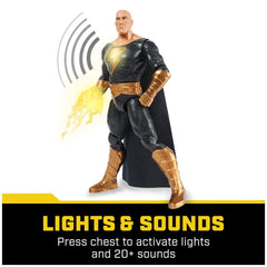 DC Comics Black Adam action figure features a muscular build in a black and gold costume, emitting yellow energy from its han