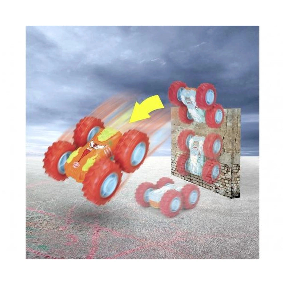 Red Dickie Monster Flippy toy car with four wheels and a yellow arrow, positioned against an indistinct brick wall background