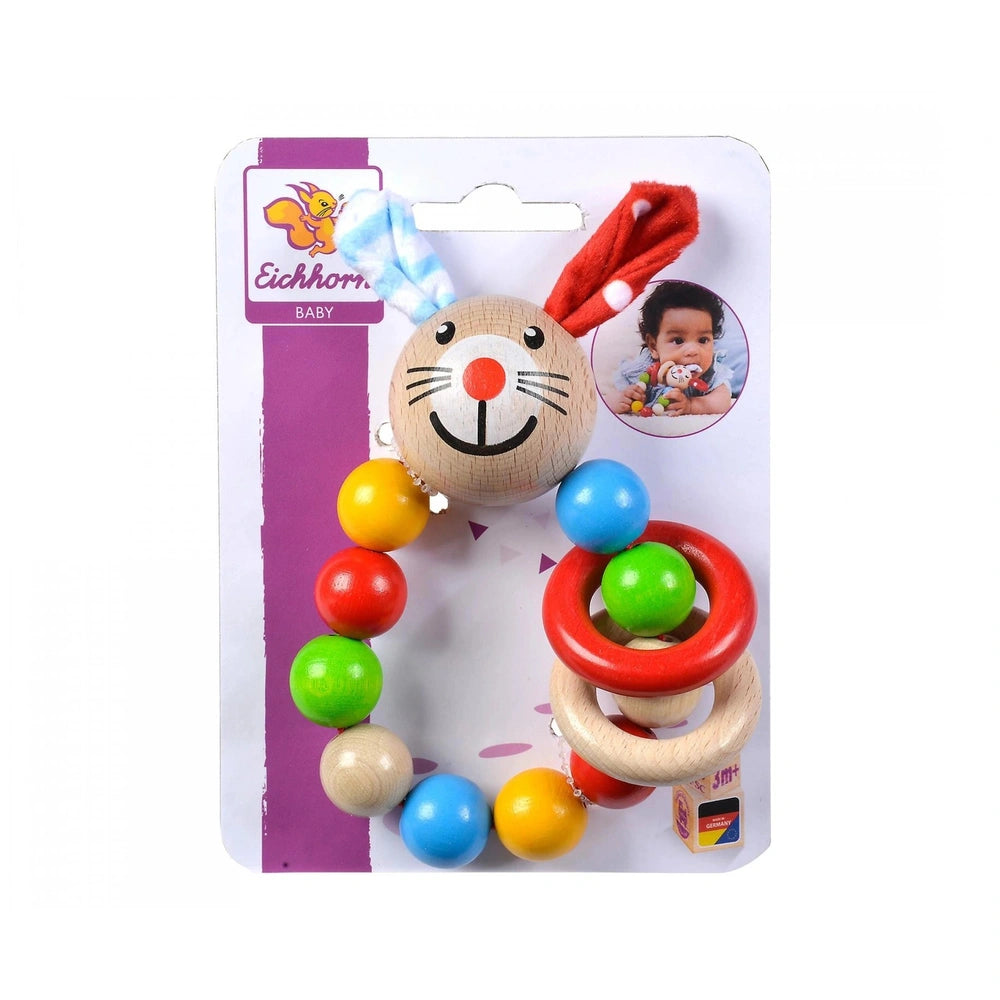 Eichhorn baby wooden teething ring rabbit rattle features colorful balls and a smiling face against a white background.
