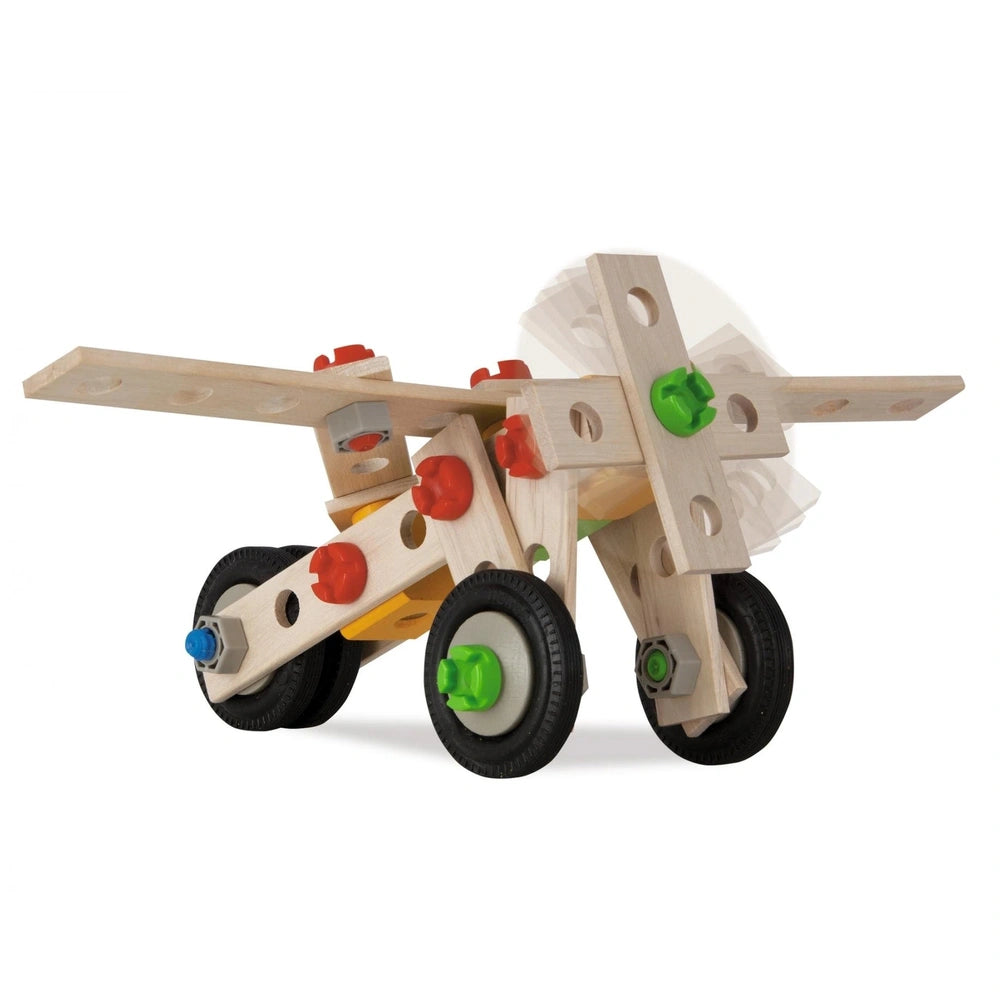 Wooden toy airplane with a yellow body, red and green accents, featuring a wooden propeller and plastic wheels.