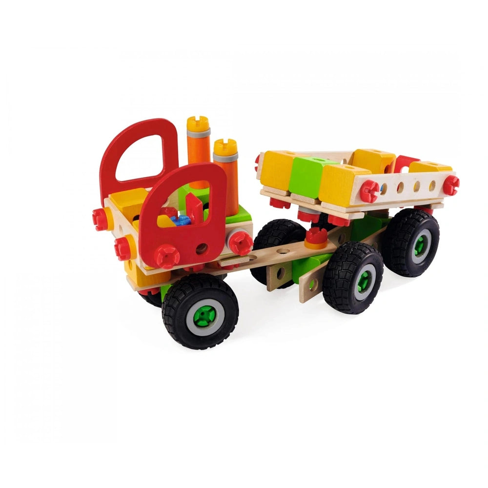 Eichhorn Constructor Truck features a red cab, green flatbed trailer, and black wheels with green accents on a white surface.