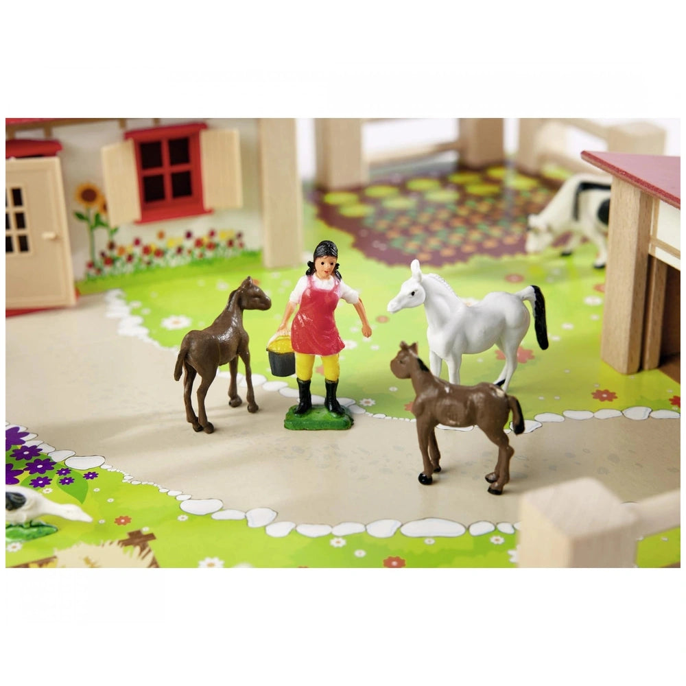 Eichhorn Little Farm Set featuring a girl, horse, donkey, and a wooden house in a colorful rural play scene.