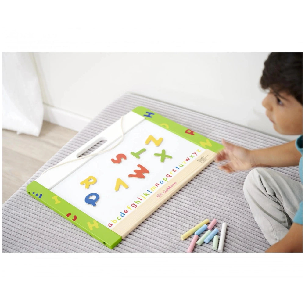 Eichhorn Magnetic and Chalkboard educational toy with a child arranging colorful letters on a white board.
