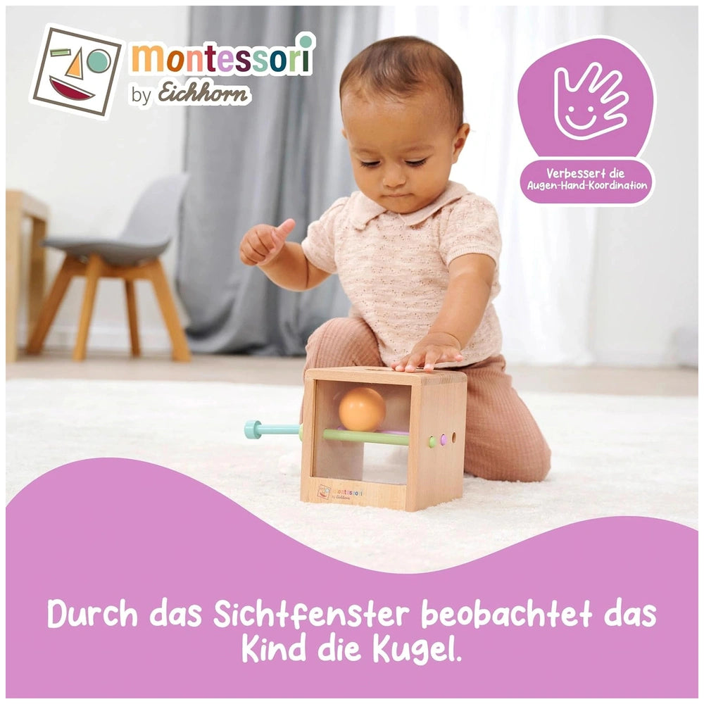 Eichhorn Montessori interactive toy set showcases a toddler engaged with a wooden rattle, promoting motor skills and visual t