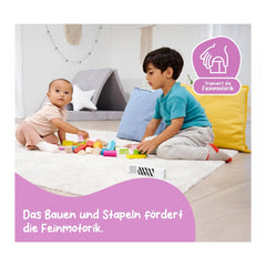 Eichhorn Wooden Blocks in Bucket - Two children playing with colorful blocks on a light carpet, enhancing fine motor skills.