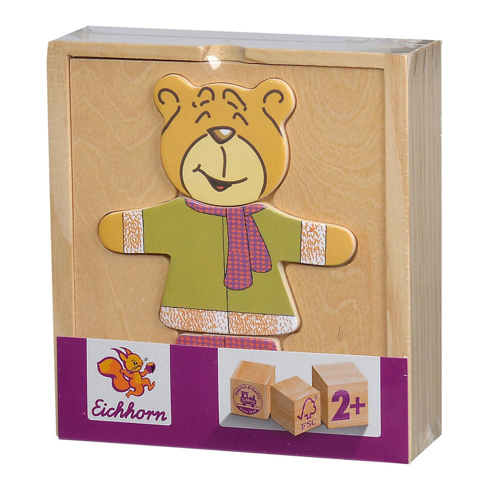 Eichhorn Wooden Puzzle Bear 20 Pcs featuring a smiling teddy bear in a green shirt, excited pose against a wooden background.