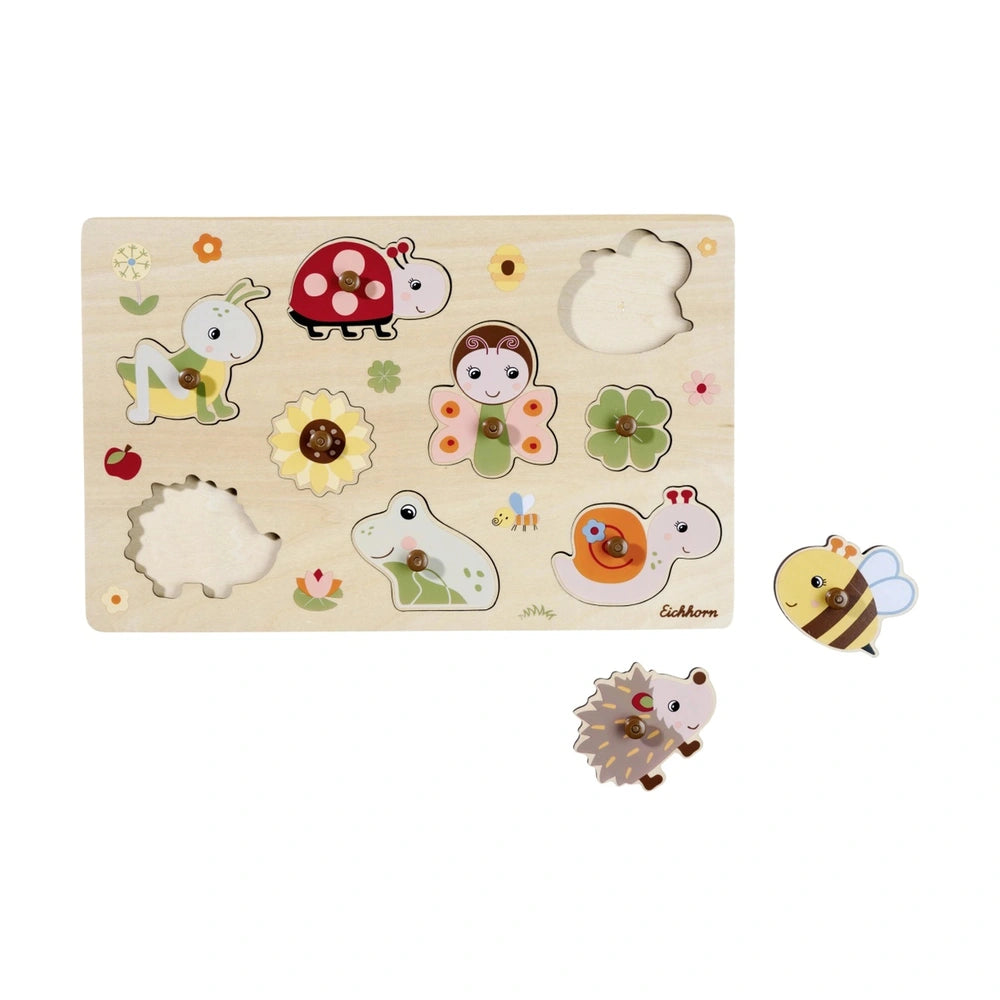 Eichhorn Woodland Animals Puzzle featuring colorful wooden animal and flower cutouts on a natural wood board.