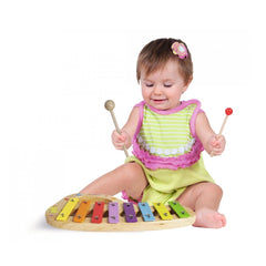Eichhorn xylophone with a child in colorful outfit playing joyful notes on vibrant wooden bars.