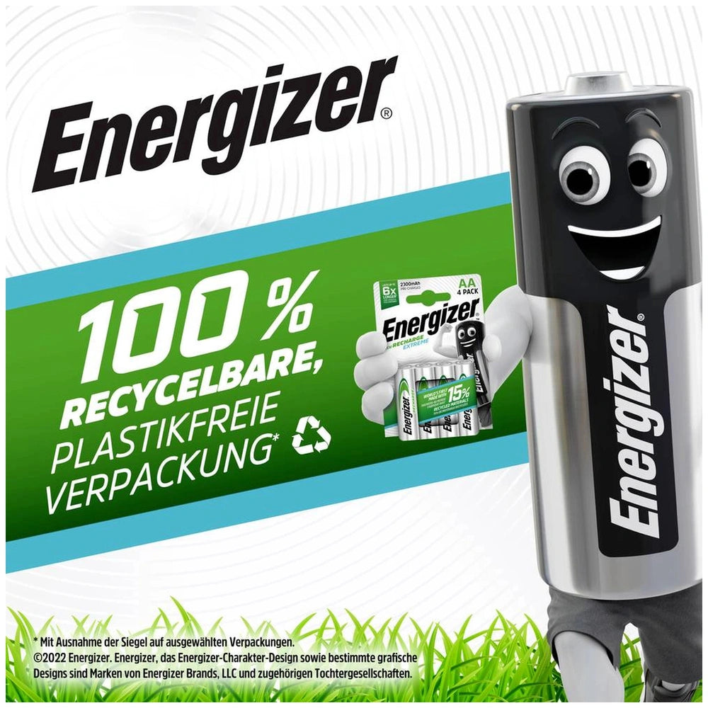Energizer Extreme HR06 AA rechargeable battery packaging on green grass, featuring recyclable materials and bold branding.