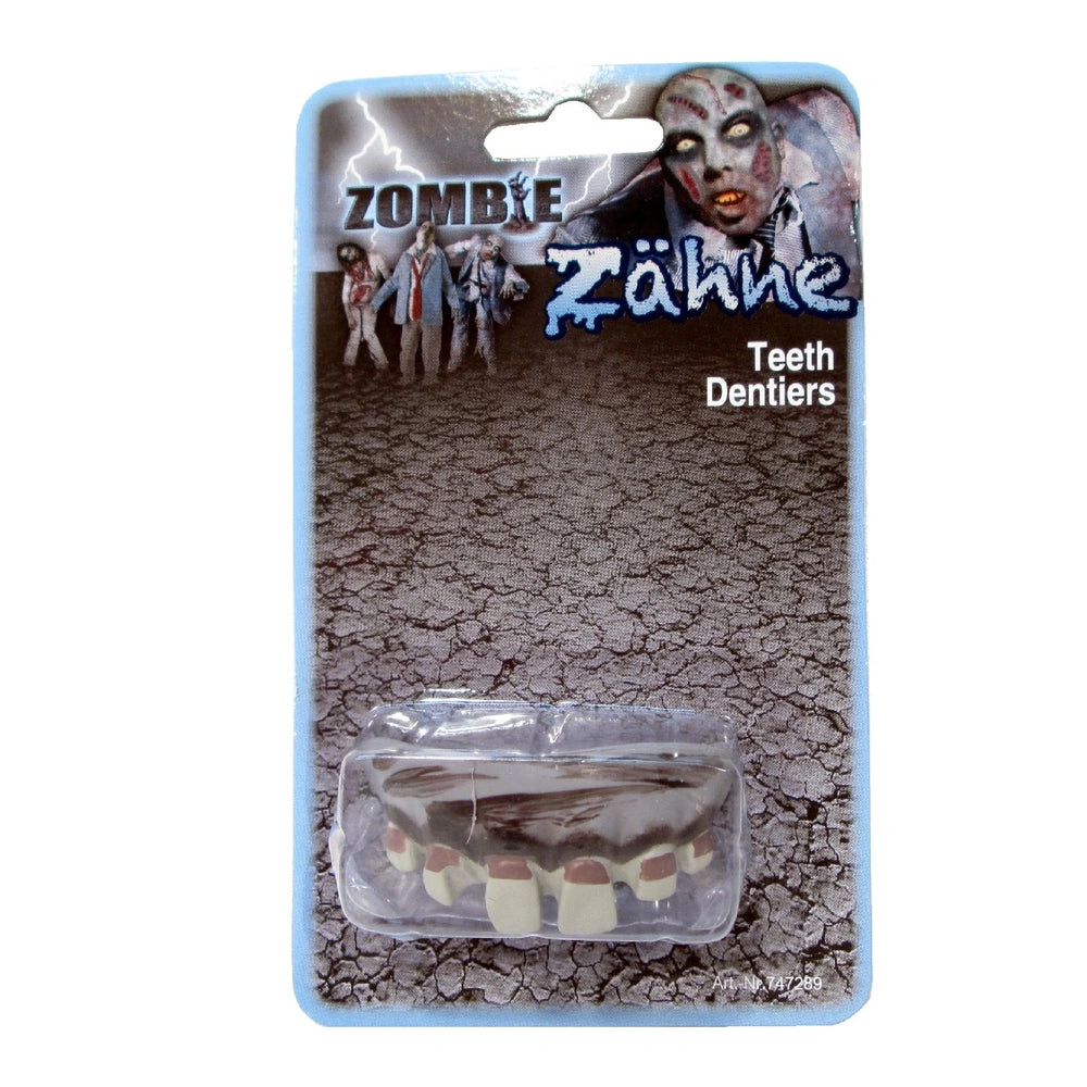 Zombee prosthetic dentures in soft foam latex, displayed in matte cardboard packaging with a transparent window and toothbrus