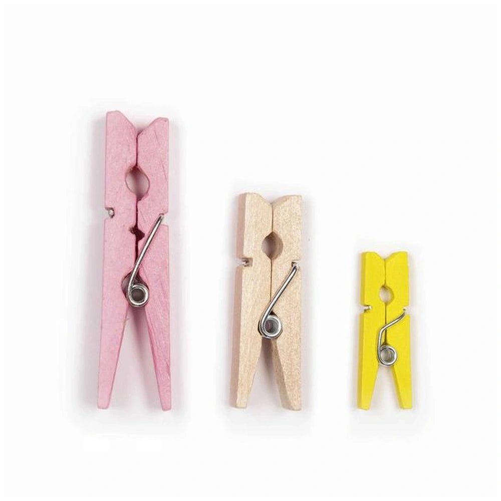 Folia wooden clips in pink and yellow with a silver metal clasp, arranged centrally for arts and crafts use.