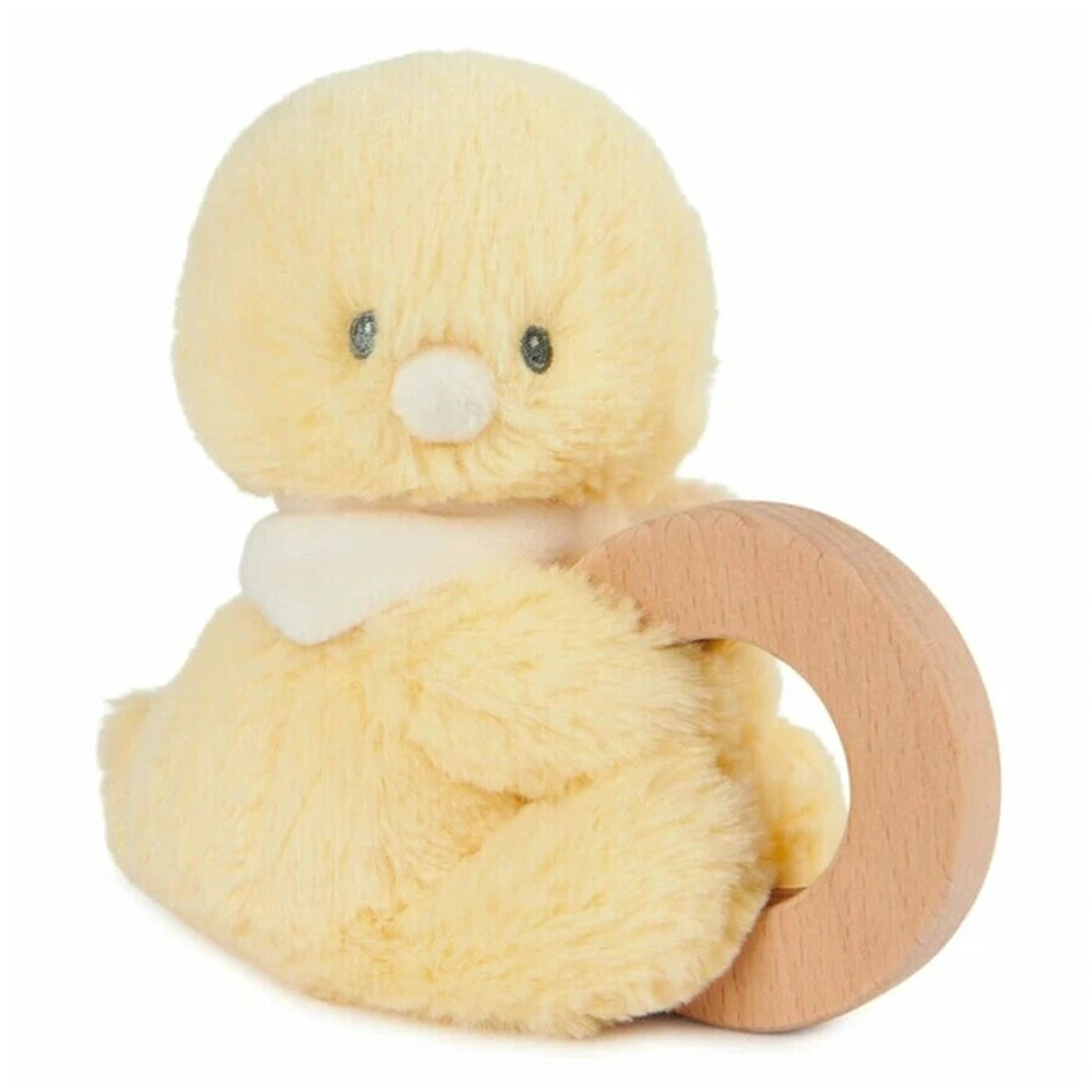 Gund Soft Animal Ring Rattle features a yellow plush creature holding a smooth wooden ring, set against a plain white backgro