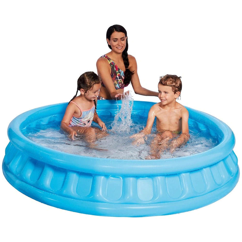 Happy People inflatable pool with a woman and two children, enjoying water play and hair washing in a textured blue pool.