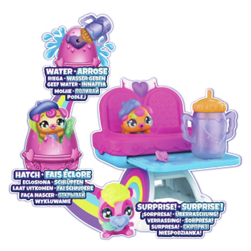 Hatchimals Alive playset features colorful toys, including a character, highchair, and accessories in vibrant pink and purple